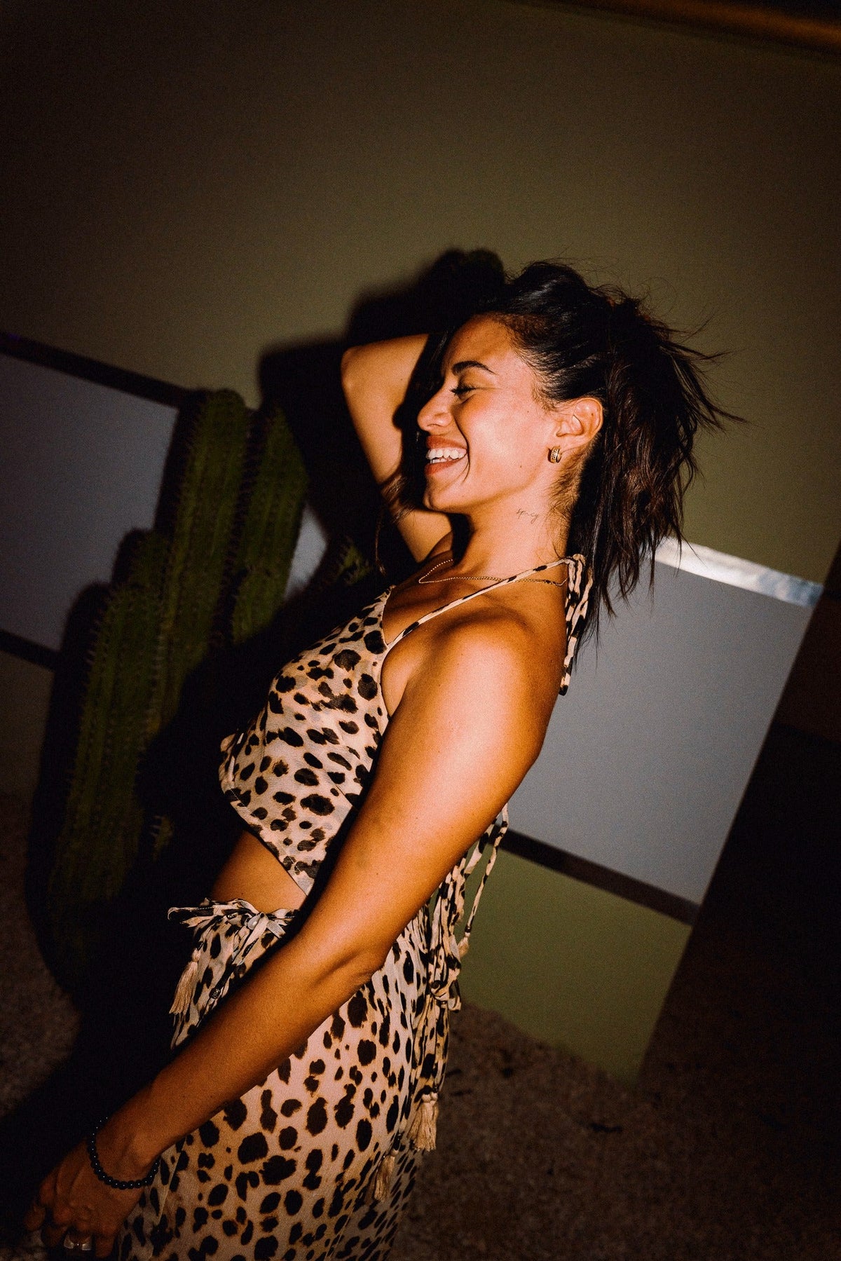 CHICHI straight-neck cropped halter top in cheetah print, side styling