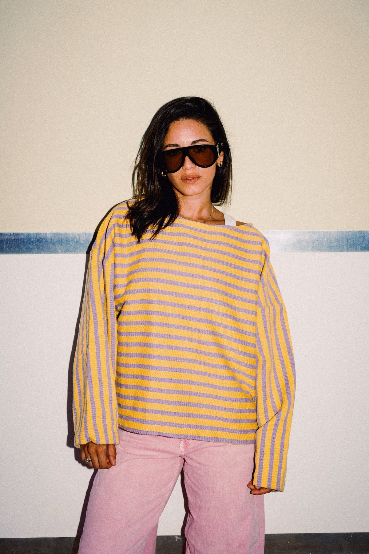 DANDELION yellow and lilac striped oversized woven cotton jumper styled with pink trousers