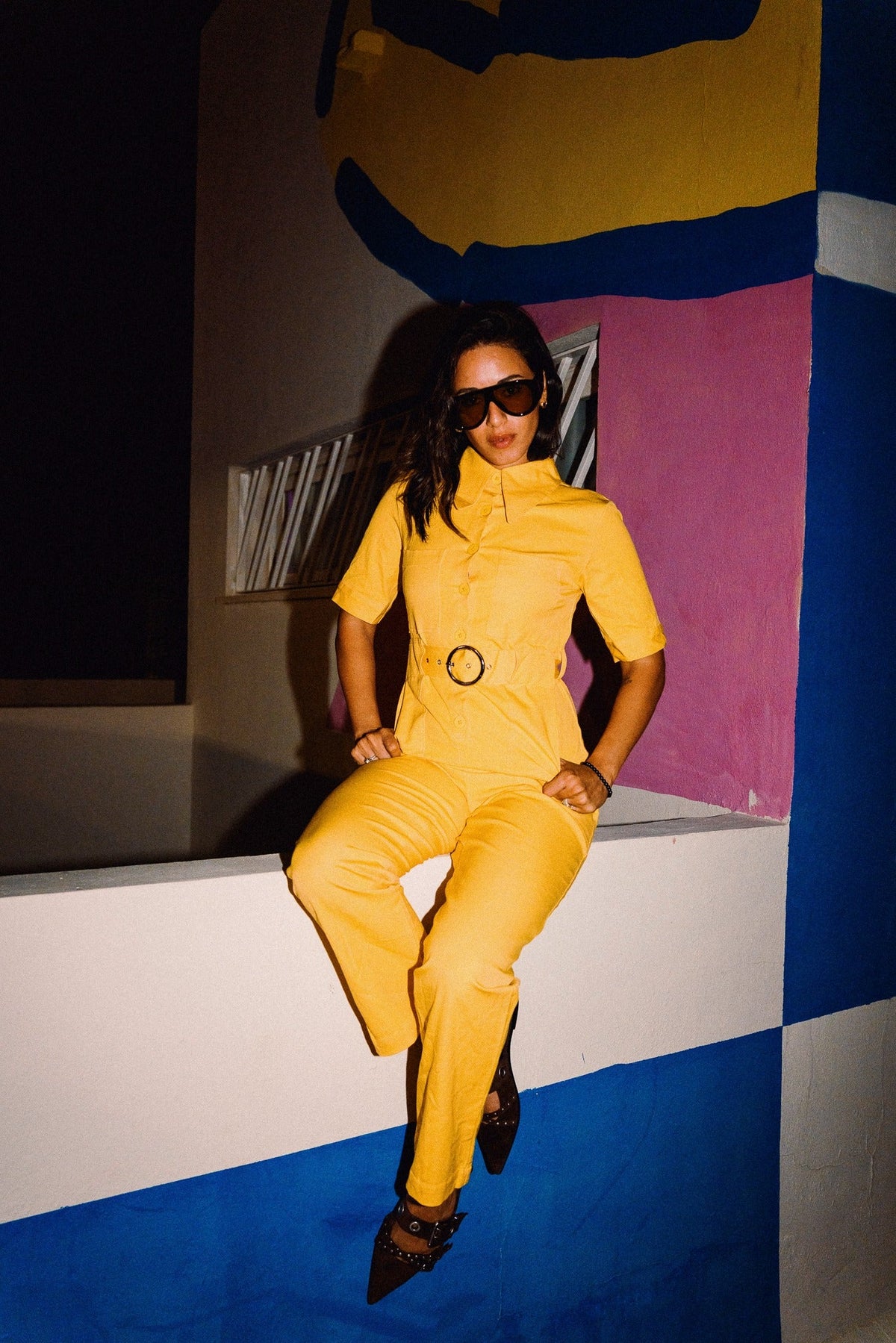 HEIDI Buttercup Yellow belted stretch cotton jumpsuit – OOTO Clothing editorial image 4