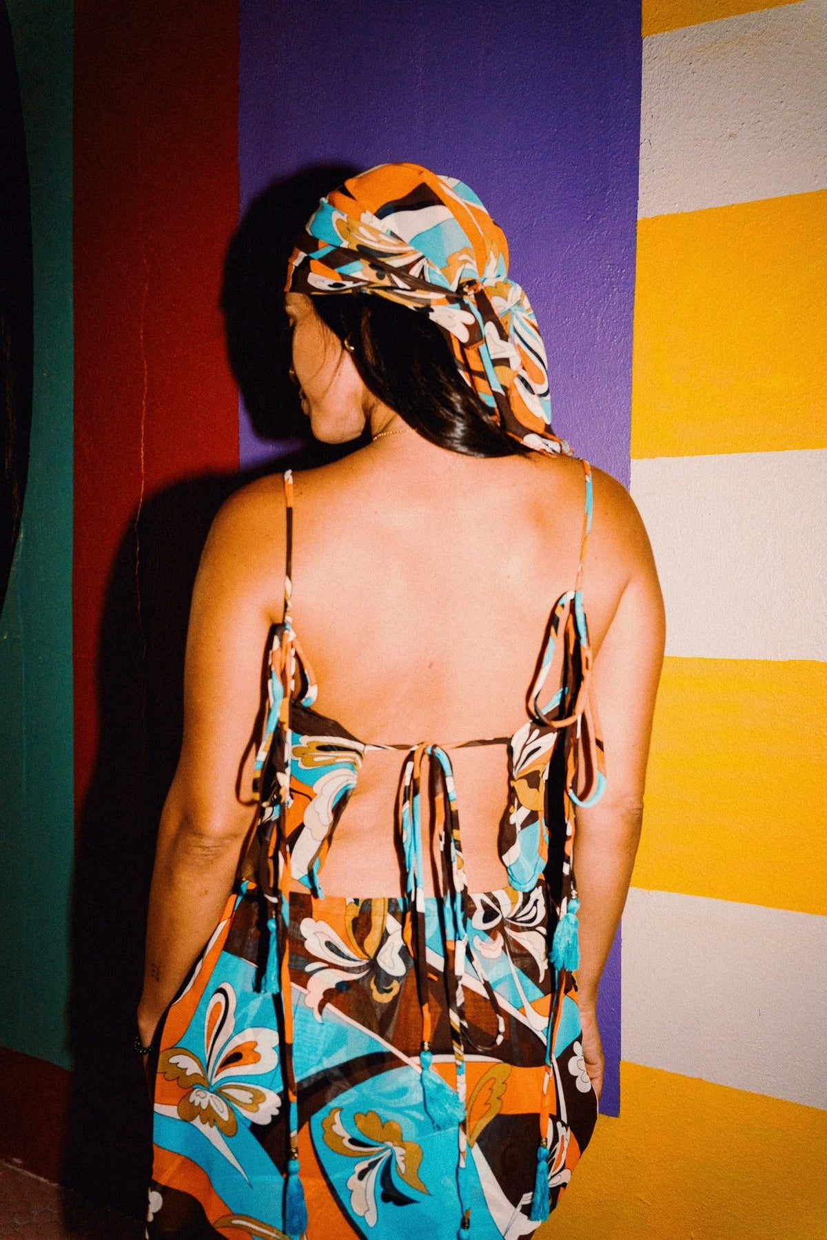 LUCHIA retro floral print tie-back crop top in turquoise orange and brown, styled with matching mini skirt – view 15
