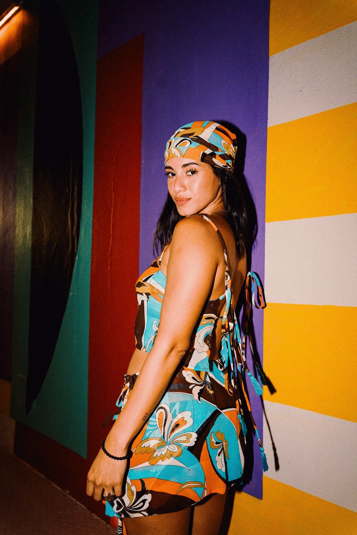 LUCHIA retro floral print tie-back crop top in turquoise orange and brown, styled with matching mini skirt – view 7