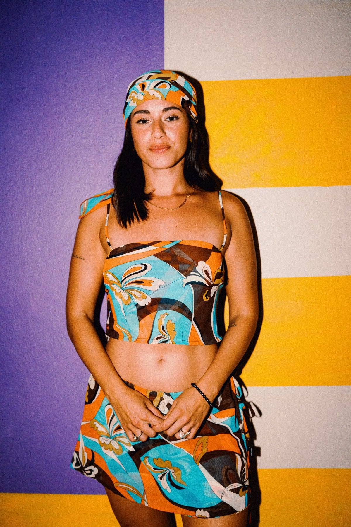 LUCHIA retro floral print tie-back crop top in turquoise orange and brown, styled with matching mini skirt – view 11