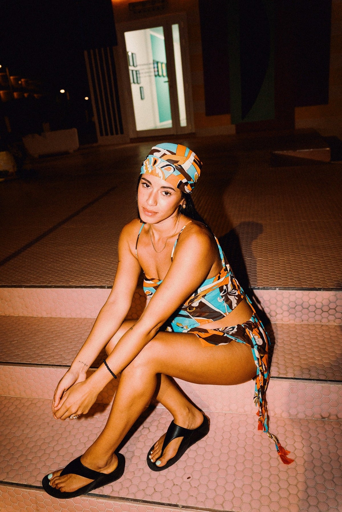 LUCHIA retro floral print tie-back crop top in turquoise orange and brown, styled with matching mini skirt – view 10