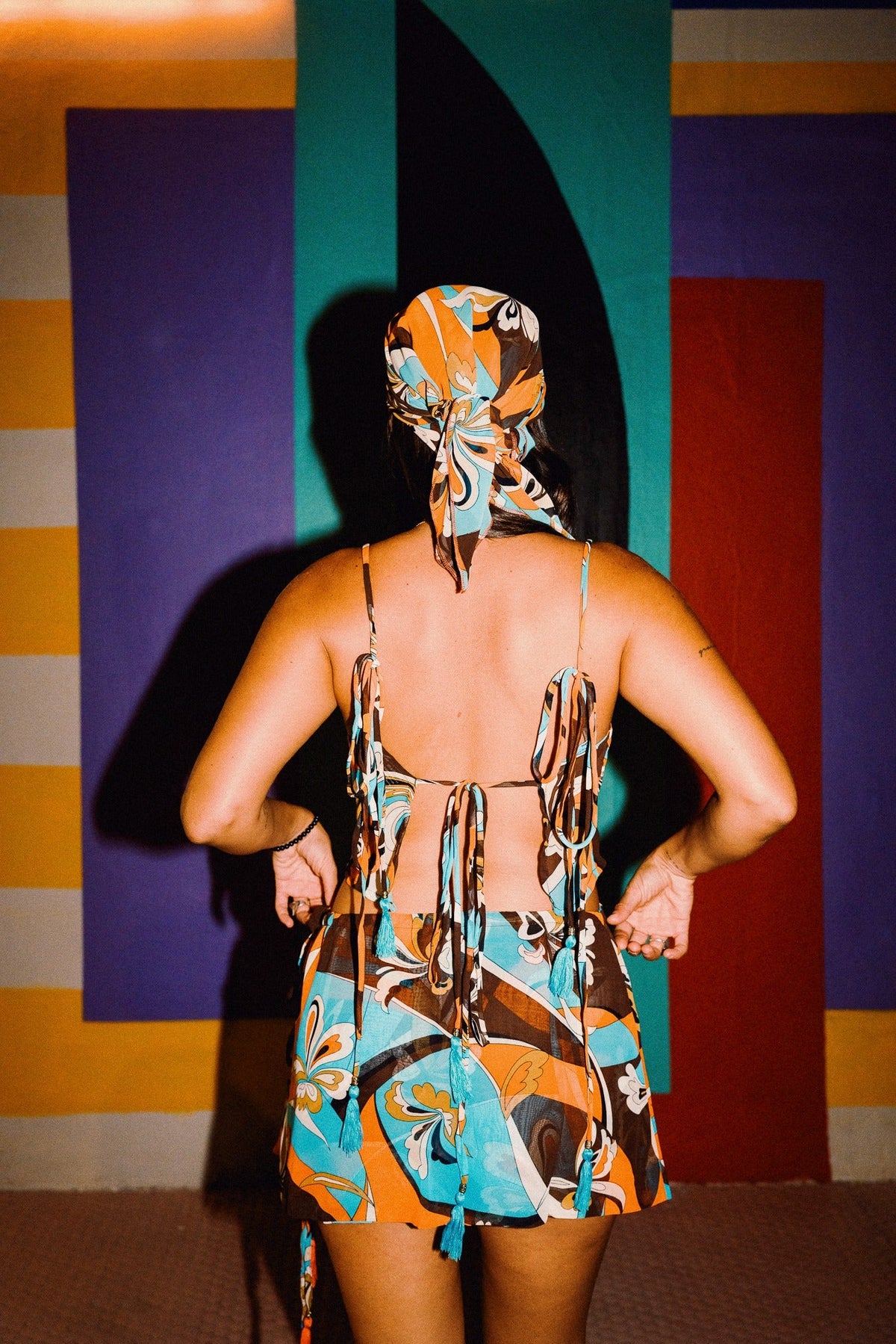 LUCHIA retro floral print tie-back crop top in turquoise orange and brown, styled with matching mini skirt – view 5