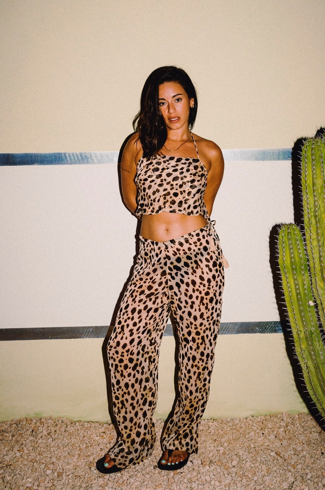 CHICHI cheetah print wide leg trousers worn with matching halter top, sold separately