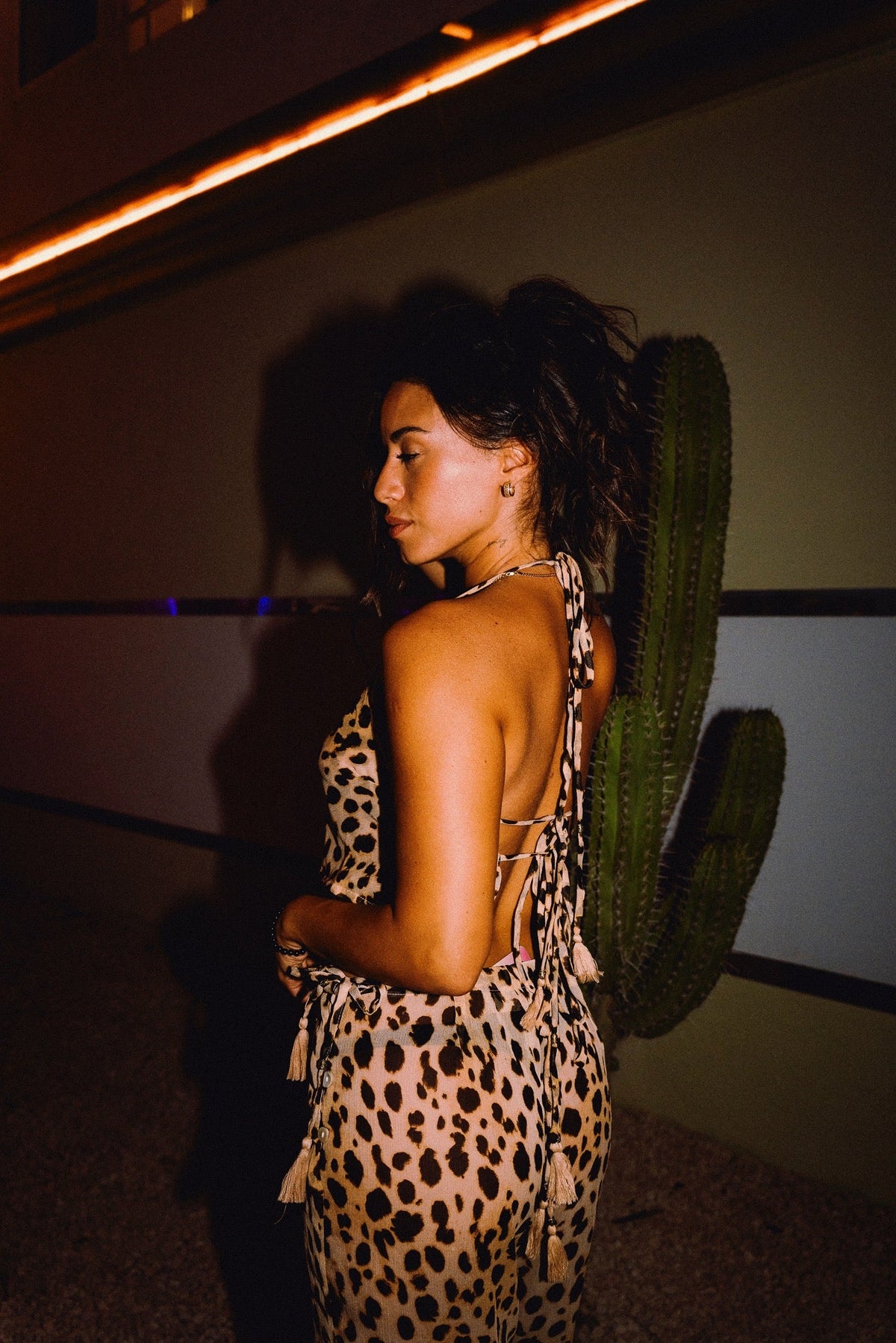 Side view of CHICHI cheetah print chiffon trousers with matching top