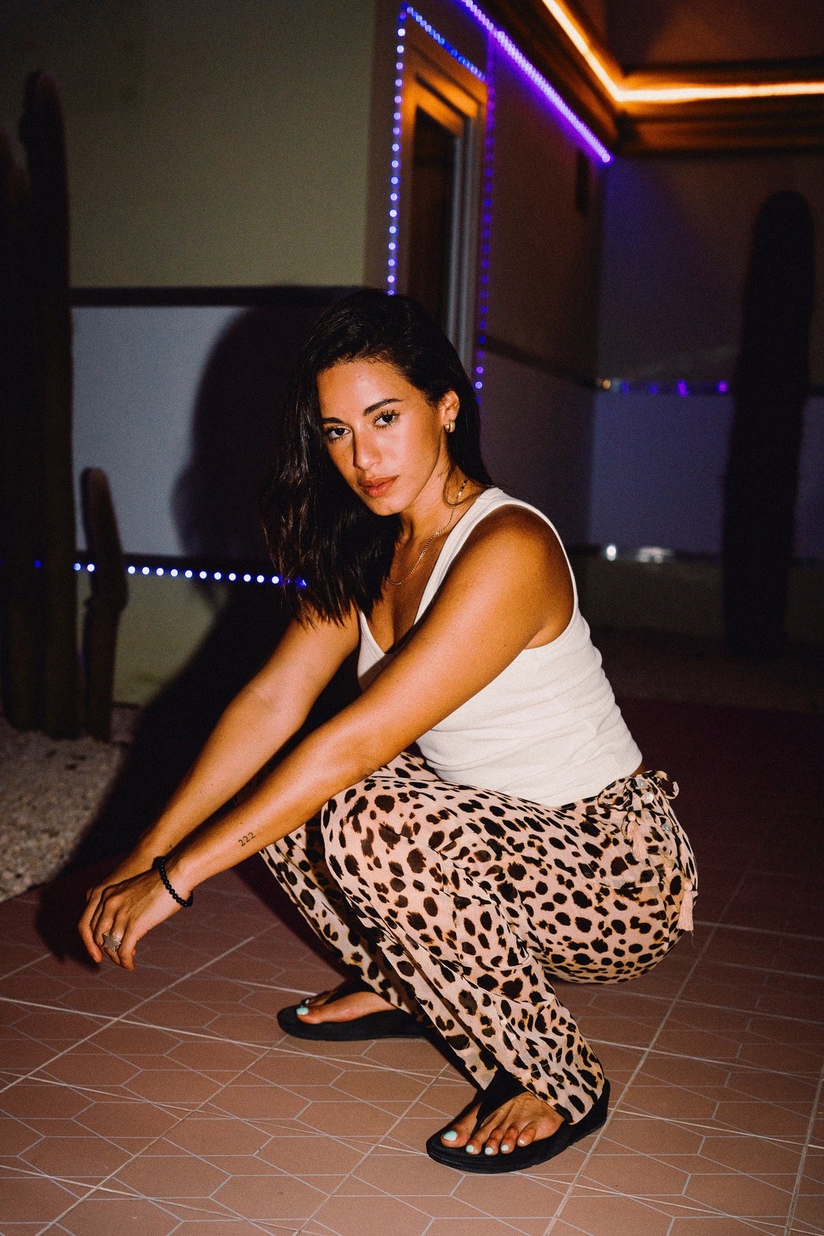 CHICHI cheetah print wide leg trousers styled casually with white vest