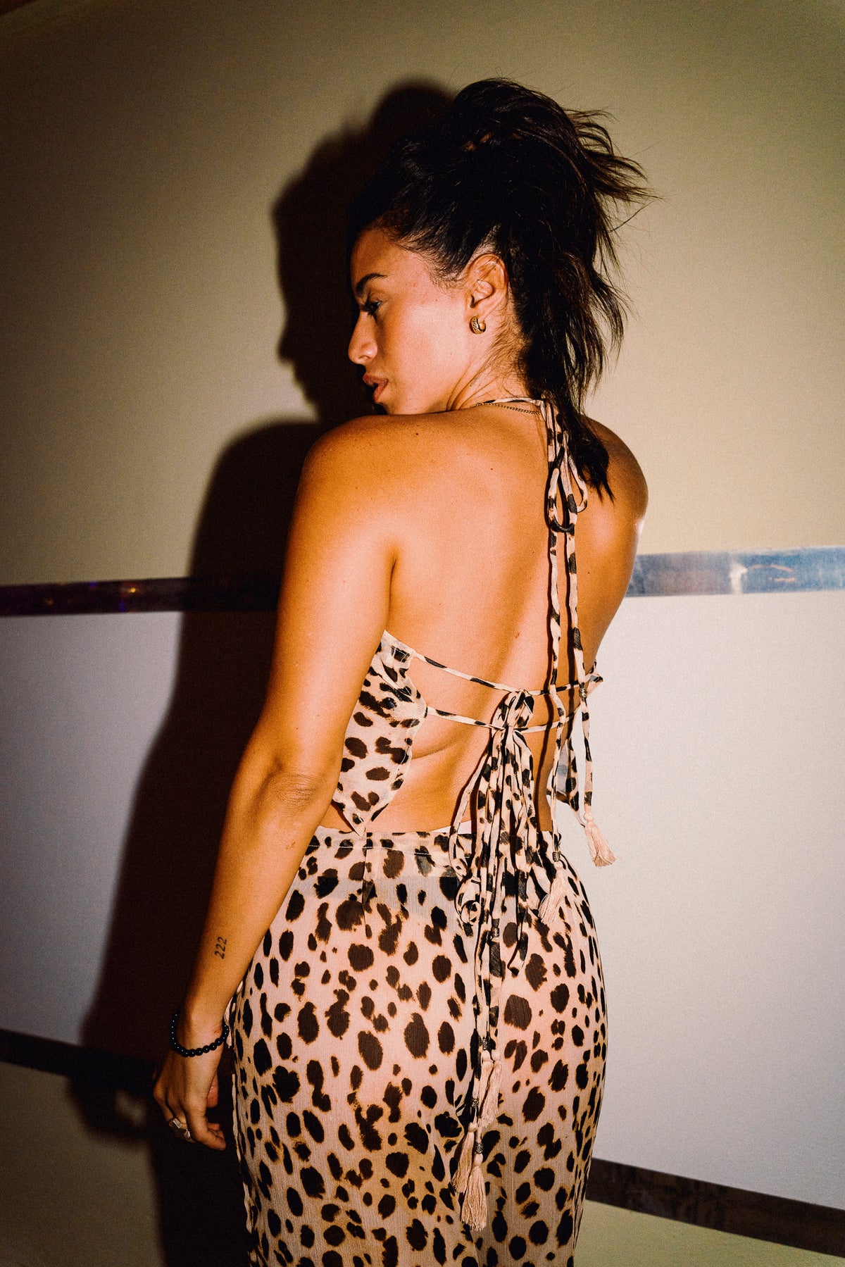 CHICHI cheetah print chiffon trousers styled with coordinating halter top