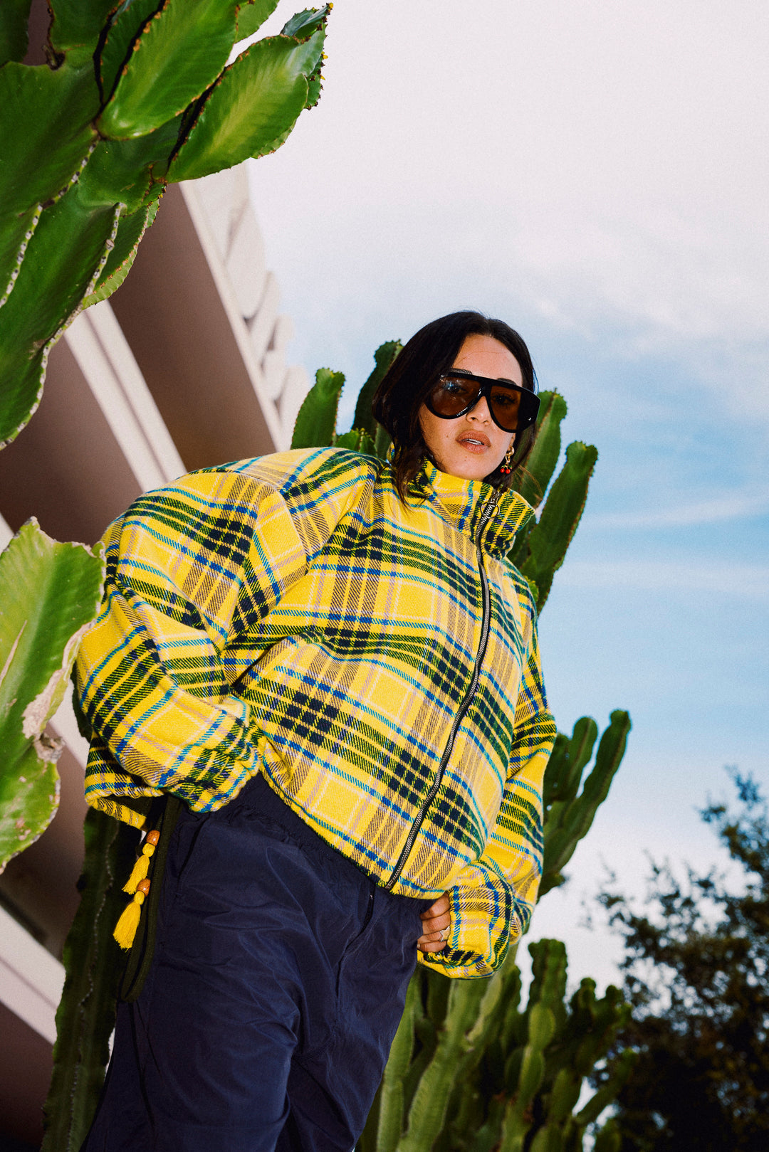 Close up of STOOP yellow tartan oversized fleece jacket