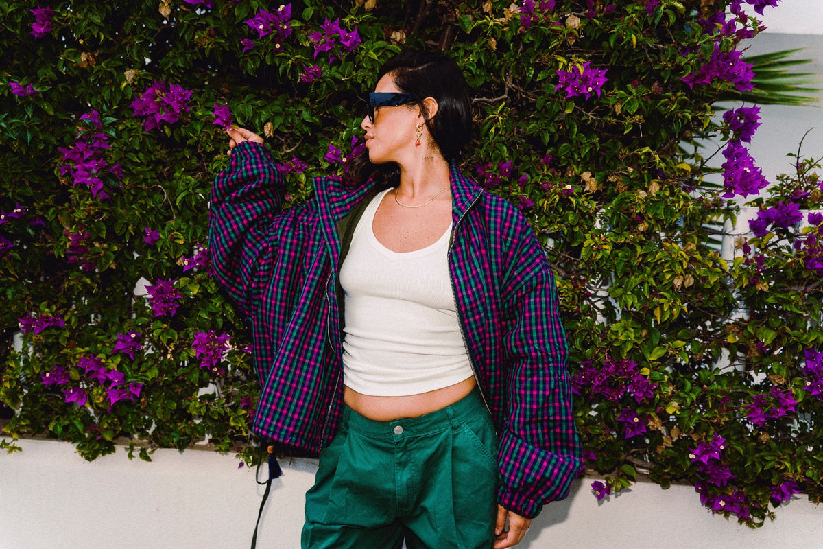 STOOP pink and navy checked oversized bomber jacket, styled with green trousers, view 9