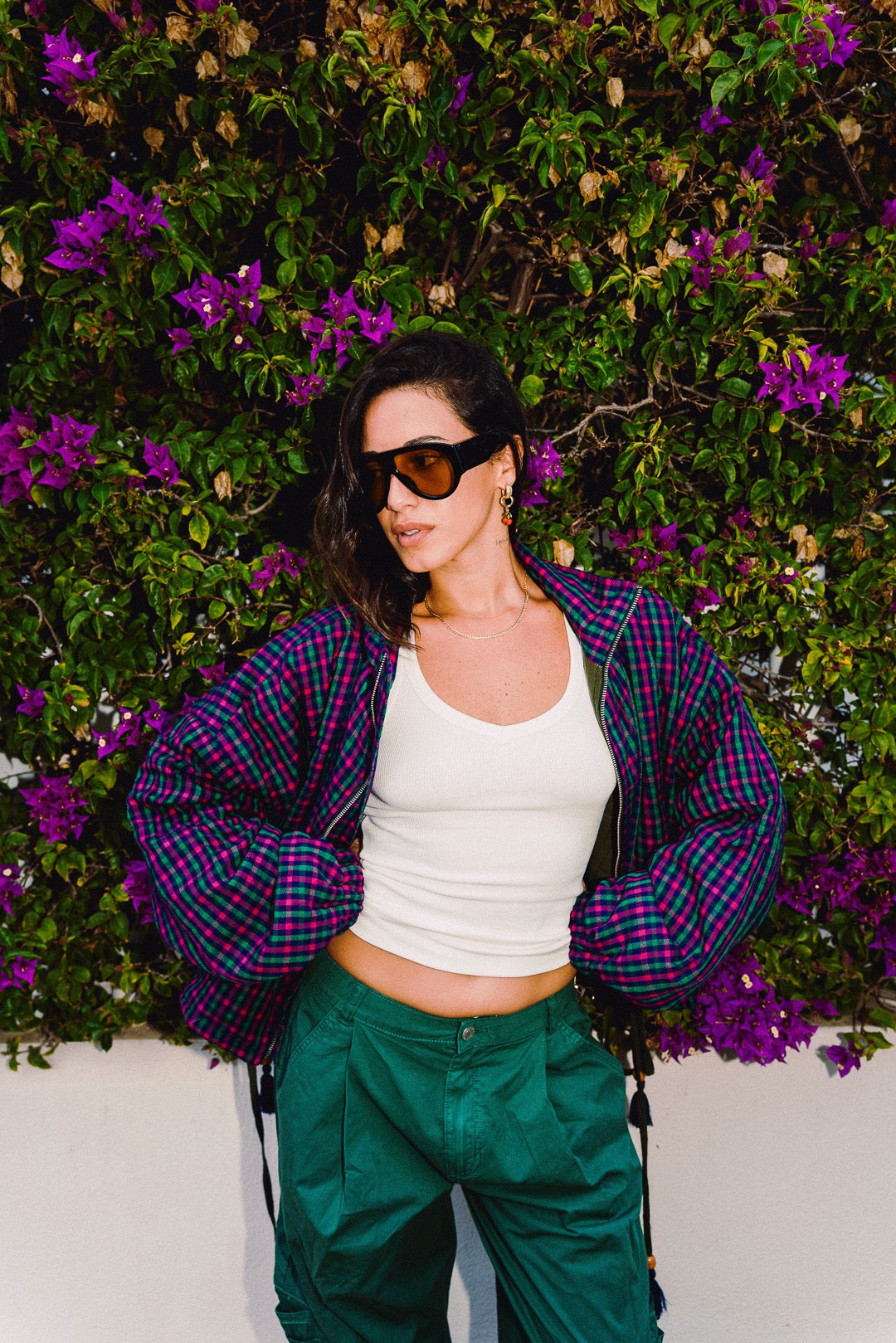 STOOP pink and navy checked oversized bomber jacket, styled with green trousers, view 10