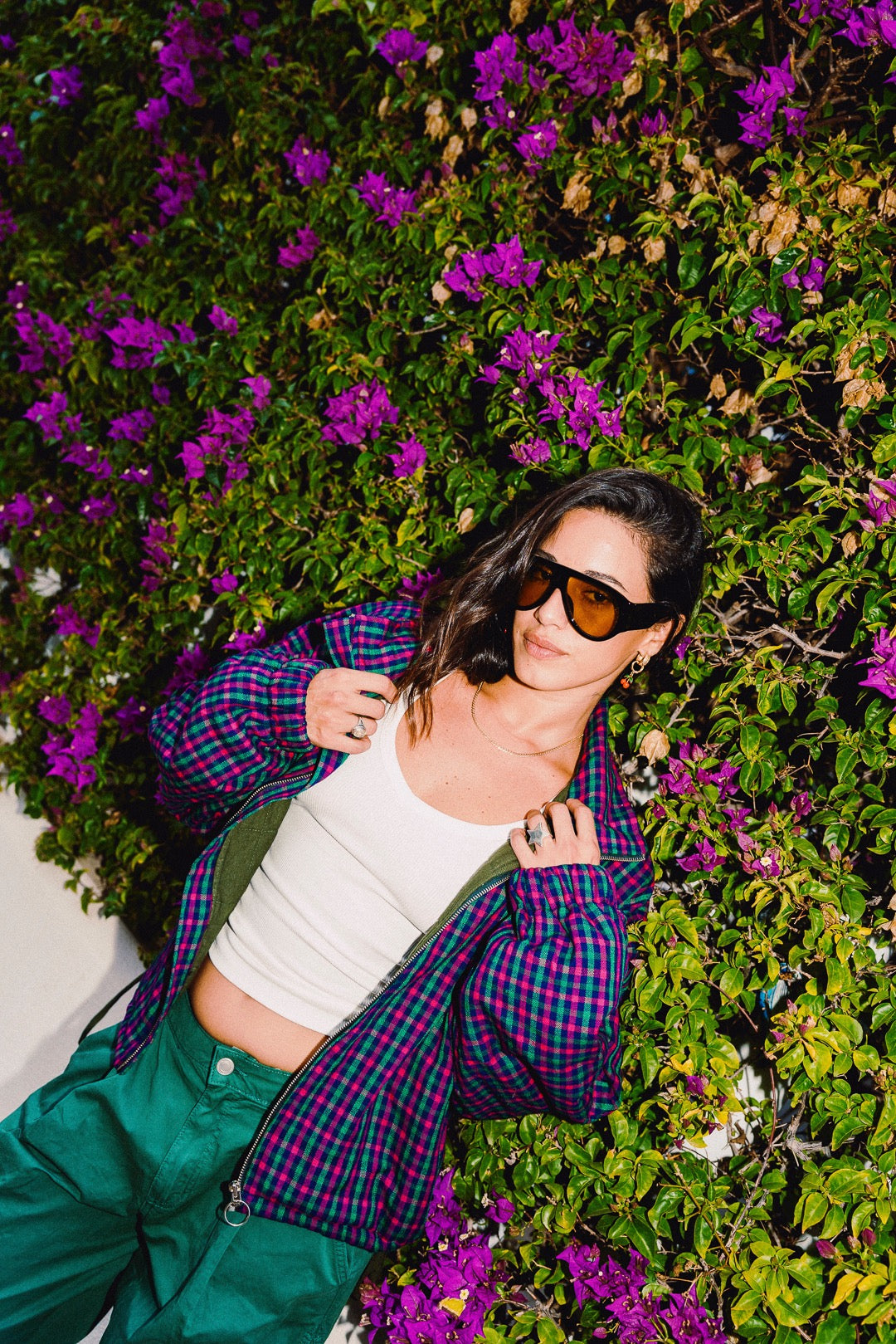 STOOP pink and navy checked oversized bomber jacket, styled with green trousers, view 11