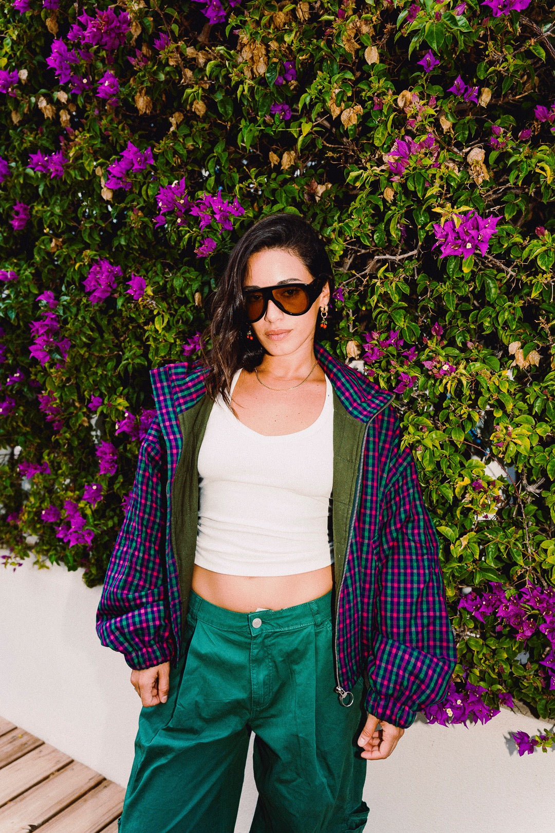 STOOP pink and navy checked oversized bomber jacket, styled with green trousers, view 13