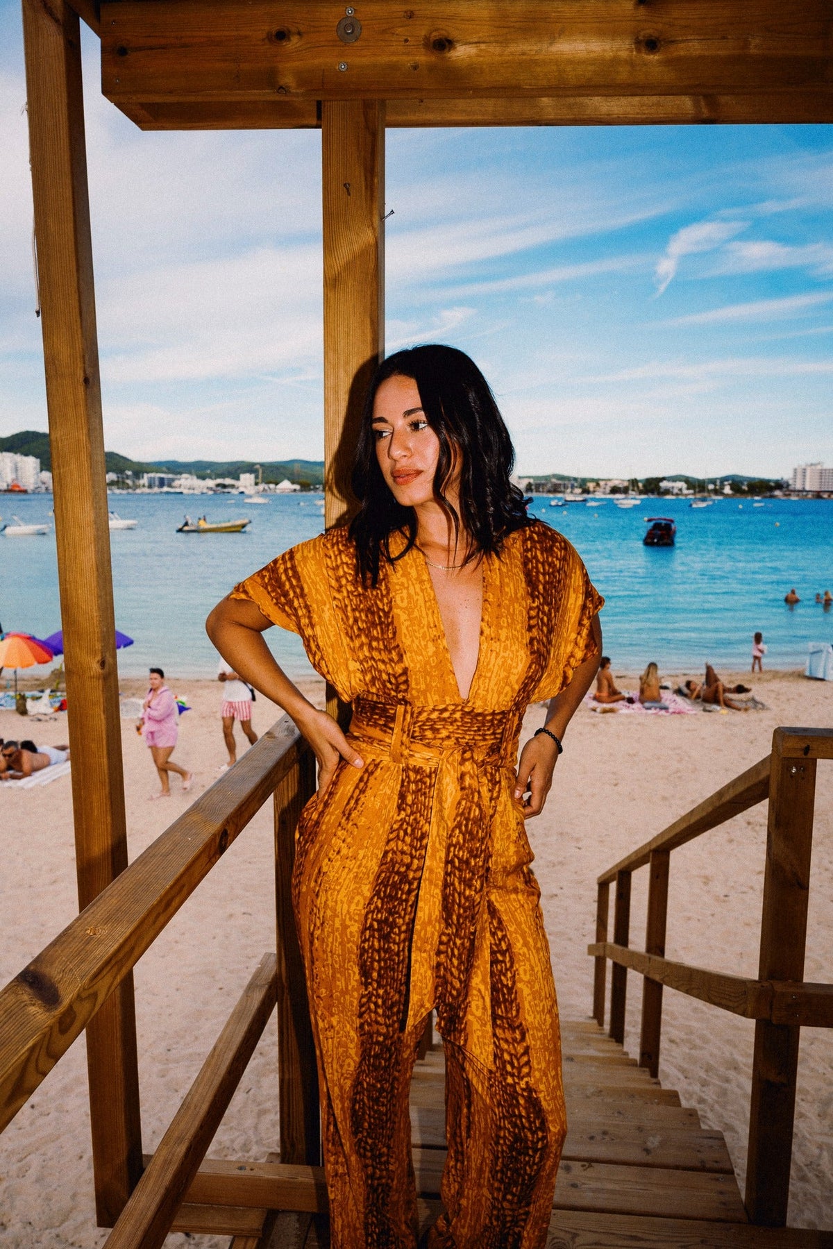 TINA REFINED Golden Hour jumpsuit – Beach styling with deep plunge
