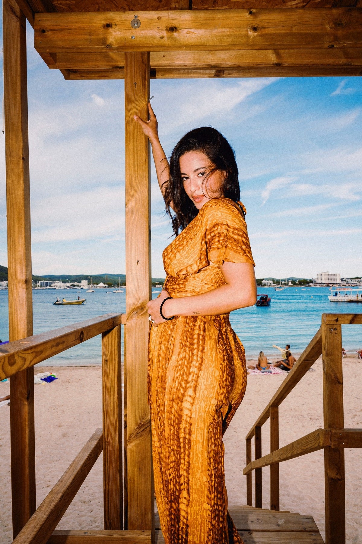 TINA REFINED Golden Hour jumpsuit – Front plunge and wide-leg fit