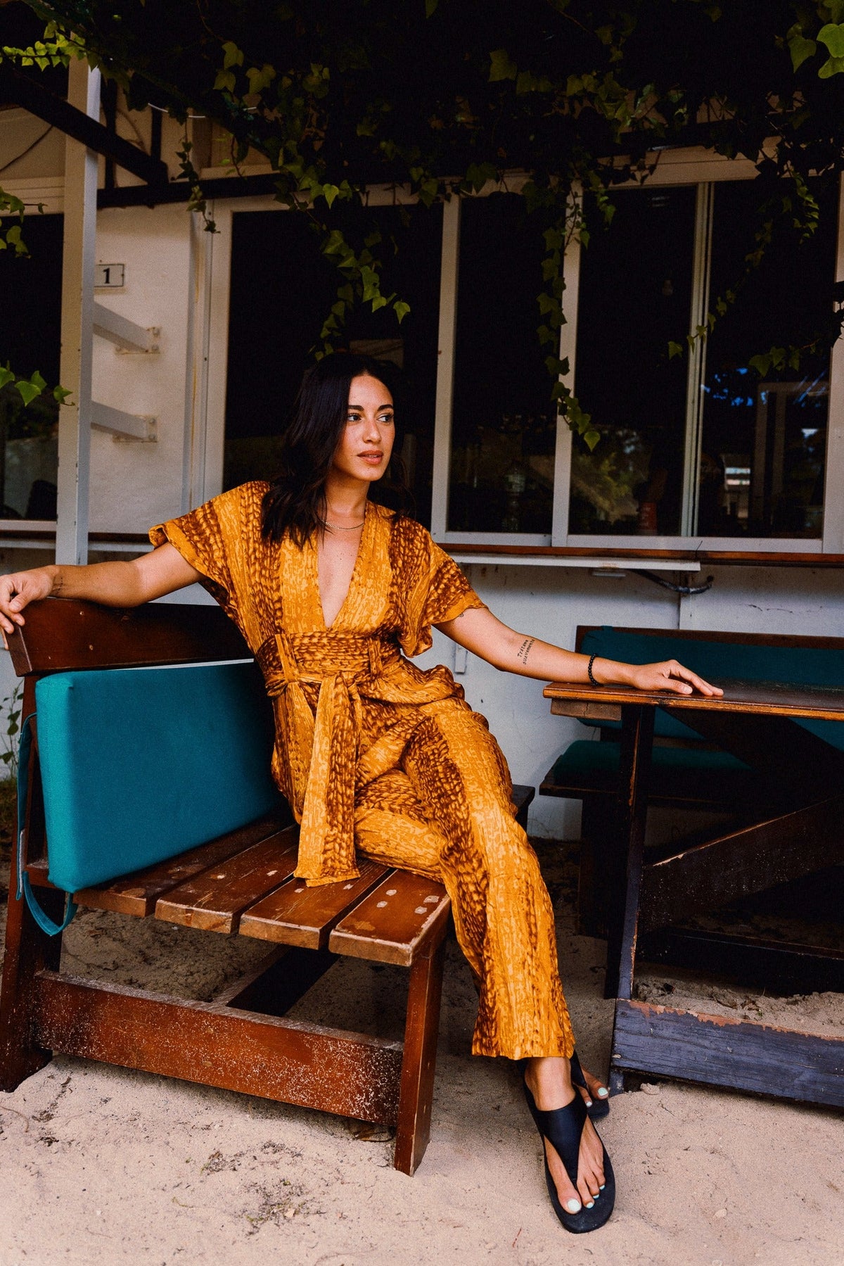 TINA REFINED Golden Hour jumpsuit – Plunge neckline and flowing trousers