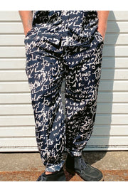 TEXT Print Trousers
